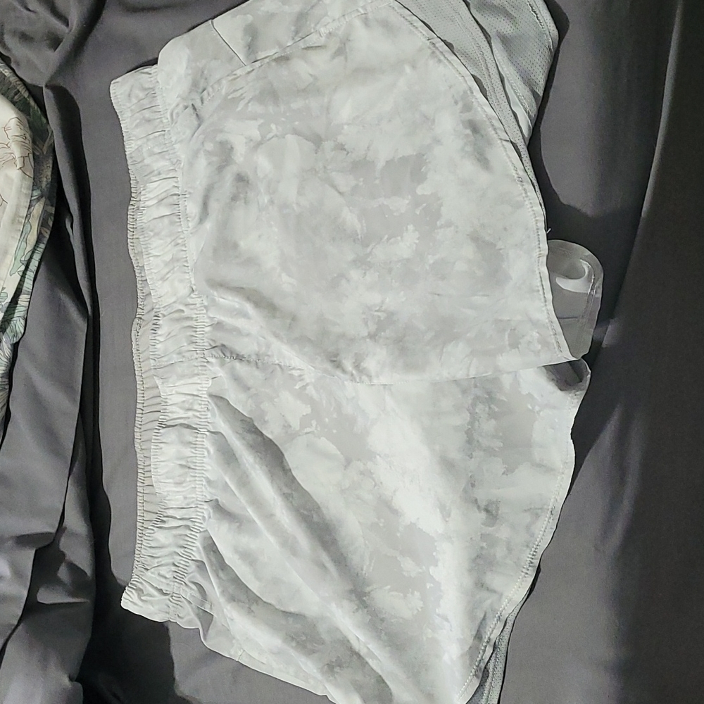 White marble running shorts